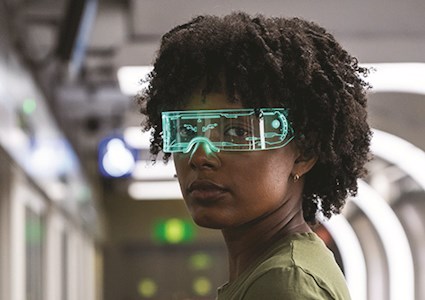 Young woman wearing smart glasses