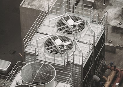 An aerial look at a building's rooftop HVAC equipment