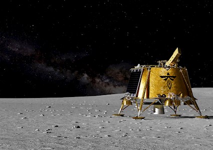 A rendering of a four-legged square-ish gold, shimmering piece of equipment stands upright on the surface of the moon. 