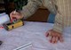 a civil engineer works with the tools of the trade on a table