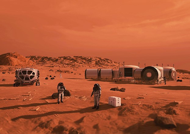 A series of cylindrical habitats are shown on the surface of Mars along with a vehicle and several astronauts, all against a red sky and red regolith. 
